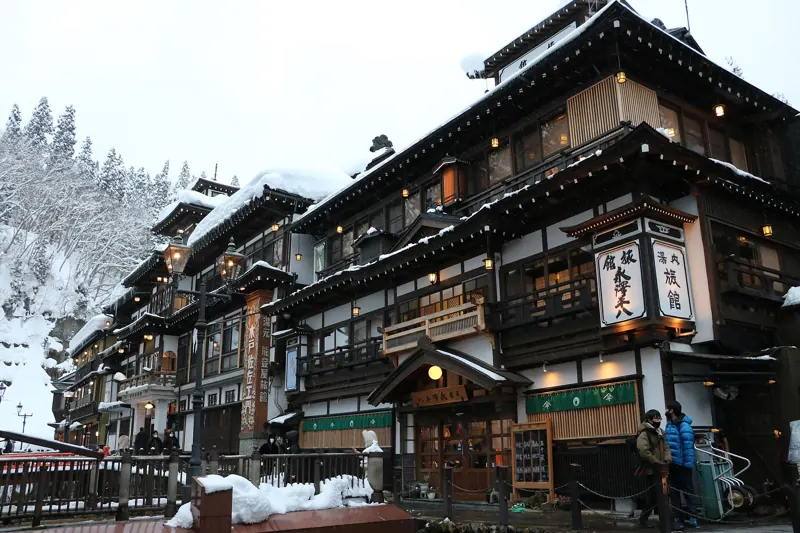 Wooden ryokan in Ginzan Onsen in winter